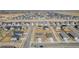 View of neighborhood homes lined up with streets and nearby plains at 17847 E 95Th Ave, Commerce City, CO 80022