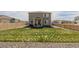 View of a fenced backyard with a grass lawn at 17847 E 95Th Ave, Commerce City, CO 80022