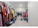 Walk-in closet with metal racks and ample storage space at 17847 E 95Th Ave, Commerce City, CO 80022