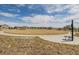 A large community green with a gazebo, playground and walking path at 17847 E 95Th Ave, Commerce City, CO 80022