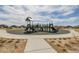 A charming community playground with slides and climbing equipment at 17847 E 95Th Ave, Commerce City, CO 80022