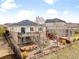 Backyard featuring a patio and stone facade at 6031 S Irvington Ct, Aurora, CO 80016