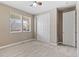 Bedroom featuring neutral walls, carpet, a ceiling fan, and a closet at 6031 S Irvington Ct, Aurora, CO 80016