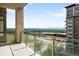 Enjoy beautiful landscape views from this home's balcony with an aluminum railing and concrete floor at 7600 Landmark Way # 904, Greenwood Village, CO 80111