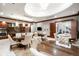 Spacious dining area with round tables, comfortable seating, and elegant lighting at 7600 Landmark Way # 904, Greenwood Village, CO 80111