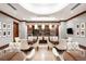 Elegant dining room features round tables with leather chairs, great for entertaining at 7600 Landmark Way # 904, Greenwood Village, CO 80111