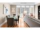 Open concept living and dining area with hardwood floors at 7600 Landmark Way # 904, Greenwood Village, CO 80111