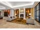 Cozy lobby with a fireplace, plush seating, and elegant decor in a modern style at 7600 Landmark Way # 904, Greenwood Village, CO 80111
