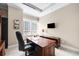 Spacious office with a large desk, comfortable chair, and natural light from the window at 7600 Landmark Way # 904, Greenwood Village, CO 80111