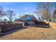 Expansive backyard featuring a multi-level deck, ideal for outdoor gatherings and enjoying the natural surroundings at 2300 Willow Ln, Lakewood, CO 80215