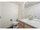 Clean bathroom with single sink vanity and toilet at 1805 W 101St Ave, Thornton, CO 80260