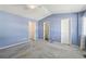 Second bedroom with light blue walls and carpeted floors at 1805 W 101St Ave, Thornton, CO 80260