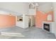 Spacious living room with a fireplace and vaulted ceiling at 1805 W 101St Ave, Thornton, CO 80260