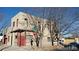 Two-story home featuring a flat roof, stucco siding, with street and neighborhood views at 3700-3704 Osage St, Denver, CO 80211