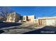 Two-story home featuring a flat roof, stucco siding, with street and neighborhood views at 3700-3704 Osage St, Denver, CO 80211