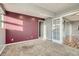 Comfortable living room featuring a gray wall and an adjoining room at 3700-3704 Osage St, Denver, CO 80211