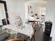 Elegant dining room flows into a stylish living room with lots of natural light at 19987 E Belleview Pl, Centennial, CO 80015