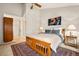 Sunlit bedroom boasts a large window, a vaulted ceiling, and a comfortable bed at 3982 Arbol Ct, Boulder, CO 80301