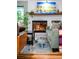 Inviting fireplace in a sunlit living room with stylish decor and comfortable seating at 3982 Arbol Ct, Boulder, CO 80301