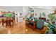 Open-concept living room with hardwood floors, abundant natural light, and modern decor at 3982 Arbol Ct, Boulder, CO 80301