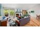 Bright living room with fireplace and large windows that offers an open floorplan at 3982 Arbol Ct, Boulder, CO 80301