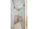 Modern glass shower features stylish tile, rainfall shower head, and built in-bench seating at 3982 Arbol Ct, Boulder, CO 80301