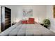 Bright bedroom with a comfy bed and plenty of storage at 1341 N Washington St # 4, Denver, CO 80203
