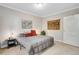 Spacious bedroom with ample natural light and wall decor at 1341 N Washington St # 4, Denver, CO 80203