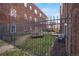 Shared courtyard with a grassy area and seating at 1341 N Washington St # 4, Denver, CO 80203