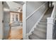 Apartment entryway with view of living room and staircase at 1341 N Washington St # 4, Denver, CO 80203