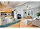 Open living room and kitchen area with hardwood floors at 1341 N Washington St # 4, Denver, CO 80203