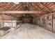 Unfinished attic with exposed wooden beams and flooring, awaiting customization at 13183 N 95Th St, Longmont, CO 80504