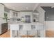 Elegant kitchen with a large island, white cabinetry, and stainless steel appliances at 13183 N 95Th St, Longmont, CO 80504