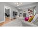 Comfortable living room with fireplace and ample space for relaxing and entertaining at 13183 N 95Th St, Longmont, CO 80504