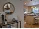 Stylish kitchen featuring wood cabinets, granite countertops, and a cozy breakfast bar at 1705 Stonehenge Dr, Lafayette, CO 80026