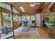 Bright sunroom featuring wood paneled ceiling, and plenty of natural light at 1705 Stonehenge Dr, Lafayette, CO 80026