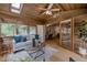 Relaxing sunroom with wood ceiling, neutral tones, and ample natural light at 1705 Stonehenge Dr, Lafayette, CO 80026