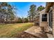 The home's grassy backyard with patio is shown at 11623 W Hornsilver Mtn, Littleton, CO 80127