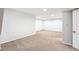 A large finished basement area with neutral carpet, recessed lighting, and bright white walls at 11623 W Hornsilver Mtn, Littleton, CO 80127