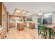 Spacious kitchen with an island, tile flooring, and a dining area at 4022 S Kalispell St, Aurora, CO 80013