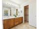 Double vanity bathroom with walk-in closet at 1894 S Marshall Cir, Lakewood, CO 80232