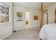 Bright bedroom with carpet flooring and neutral walls at 1894 S Marshall Cir, Lakewood, CO 80232