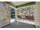 Wooden deck with lattice and a view of the backyard, a perfect space for relaxation at 1894 S Marshall Cir, Lakewood, CO 80232