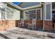 Relaxing front porch with two rocking chairs at 1894 S Marshall Cir, Lakewood, CO 80232