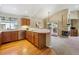 Open concept kitchen with a view to the living and dining areas at 1894 S Marshall Cir, Lakewood, CO 80232