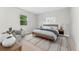 Comfortable bedroom with neutral walls, natural light, and stylish decor at 3765 E Easter Dr, Centennial, CO 80122