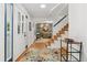 Welcoming entryway with hardwood floors, stairs, and a decorative rug at 3765 E Easter Dr, Centennial, CO 80122