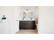 Bathroom with a modern vanity, dual sinks, and stylish fixtures at 9905 Foxhill Cir, Highlands Ranch, CO 80129