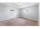 Bedroom with carpet and windows at 32171 Lodgepole Dr, Evergreen, CO 80439