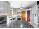 Modern kitchen featuring gray cabinets, stainless steel appliances, and granite countertops at 32171 Lodgepole Dr, Evergreen, CO 80439